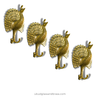 Brass peacock double hook set used as jewelry holders on a bedroom wall
