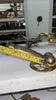 Tape measure photo showing overall size of 6 inch brass penis cabinet pull and wall hook for choosing the right fit