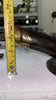 Measurement photo showing depth from wall projection of 6 inch brass penis wall hook and cabinet pull.
