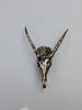 Brass gold animal skeleton hook front image with white wall