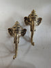 two pieces of gold ganesha elephant head with trunk towel holder