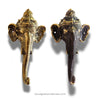 Two brass elephant wall hooks on a white background with 'ubudglassandbrass.com' text.