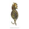Decorative gold pineapple hook on a white background