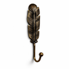 Single brass feather wall hook in antique finish for boho wall decor