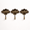 Three piece antique brass seashell wall hook set
