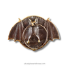 Decorative wall decor with a bat design on a white background