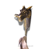 Brass dragon towel hook styled in a dark academia bathroom