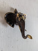 Boho home decor wall with brass elephant head hook