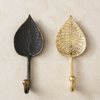 Antique bronze and gold brass leaf wall hooks side by side, showing both available finishes