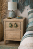 Patina brass Buddha mudra hand pulls installed on a boho bedside table drawers (set of 2)