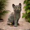 Front view of solid brass cat figurine, sculptural animal decor with vintage finish