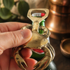 Hand holding brass crab bottle opener on beer bottle, beer lover gift, unique bar gift, practical bottle opener gift for him, and coastal bar accessory
