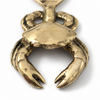 Front detail of brass crab bottle opener, solid brass beer bottle opener gift, novelty bar accessory, man cave gift, and coastal decor piece