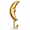 Gold brass crescent moon wall hook with face detail on a clean white background, celestial wall decor for boho and astrology-inspired interiors
