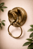 Brass eagle towel ring styled on wall, luxury bathroom decor towel holder