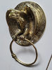 Close up of handcrafted brass eagle towel ring showing texture and detail