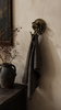 Solid brass eagle snake wall hook used as towel holder in neutral wabi sabi bathroom, antique brass double hook, gothic decor meets minimalist interior, dark academia wall hook, housewarming gift idea