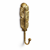 Single brass feather wall hook in gold finish on white background