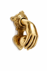 Brass fist and ball door knocker in gold finish on white background