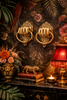 Brass fist wall sculptures styled in dramatic interior setting, bold sculptural wall art for maximalist decor lovers