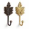 Brass grape leaf wall hook in gold and antique finishes for kitchen and vineyard decor