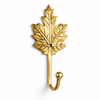 Single brass grape leaf wall hook in gold finish on white background