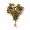 Brass grape wall hook isolated on white background, vintage wall hook, antique brass towel hook for kitchen or bathroom
