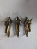 Matching brass horse wall hooks shown as a bundle set, ideal for tack room organization and symmetry on walls