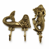 Brass mermaid wall hooks set showing single and double hook for nautical decor styling