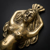 Close-up of vintage solid brass mermaid wall hook showing detailed hand-cast torso face and crown sculpting — brass mermaid coastal boho decor handmade in Ubud Bali