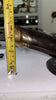 Measurement photo showing projection depth from wall for brass penis door pull used as wall hook.”