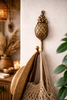 Brass pineapple wall hook used for towel and bag in tropical boho home decor