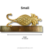 Small brass pineapple wall hook with ruler showing product dimensions