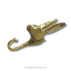 Gold Brass Rabbit shaped wall hook with white background