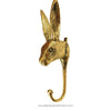 Gold rabbit-shaped hook on a white background