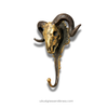 Antique brass ram skull wall hook shown at an angle, sculptural wall hook for dark academia entryway organization