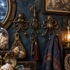 Set of brass octopus, squid, and skull-octopus hooks mounted on a deep blue gothic-style wall with shells, a mirror, and a fishing net