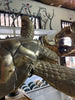 Handmade brass sea turtle sculpture in Bali workshop showing real scale and craftsmanship