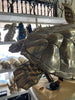 Large brass sea turtle sculpture workshop view with detailed shell and stand