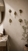 Brass seashell wall hooks styled in coastal bathroom decor beach house towel hooks