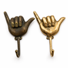 Brass shaka hand wall hook in gold and antique finish hang loose coastal decor hook