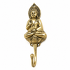 Gold brass sitting buddha wall hook isolated on white background showing full meditation posture sculpture, stacked pagoda crown detail, lotus seat and single hook arm with warm bright gold brass finish. Handcrafted spiritual coat hook, towel hook and key hook for yoga room decor, meditation space decor, zen home decor, buddhist decor and housewarming gift. Made in Bali.
