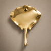 Top-down view of a solid brass stingray wall hook in gold finish, showing the sculptural design from the set of 4 coastal hooks.