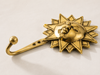 Angled side view of polished gold brass sun wall hook showing hook curve depth and wall projection – part of celestial brass wall hook set of 3 – hand-cast solid brass sunburst design – boho witchy celestial entryway decor – key hook jewelry holder – astrology gift – made in Bali