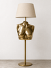 
Small brass female torso sculpture used as a lamp base with a linen shade — sculptural lamp base decor for eclectic home decor, maximalist housewarming gift handcrafted in Bali