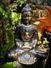 Back view Buddha statue in garden meditation decor handcrafted Bali sculpture
