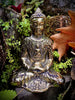 Brass Buddha statue in garden meditation decor zen outdoor spiritual sculpture