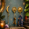 Celestial brass wall hook set of 3 featuring crescent moon hook sun and moon face hook and sun wall hook displayed in dark witchy room with candles crystals constellation wallpaper and gold frames – handcrafted boho witchy astrology home decor gift – polished gold brass made in Bali