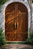 Coastal beach house wooden double doors with solid brass seashell door handles installed