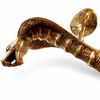 Close-up side view of cobra door pull, solid brass serpent handle showing mouth and patina detail